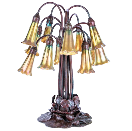 This antique Tiffany Studios bronze lamp features a lily pad motif base, decorated with leaves, tendrils and water lily buds, and twelve stems that finish with tapered and fluted yellow iridescent Tiffany Favrile glass shades